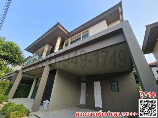 Modern two-story house with spacious garage and clean architectural lines