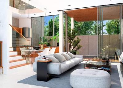 Spacious modern living room with large glass windows and garden view