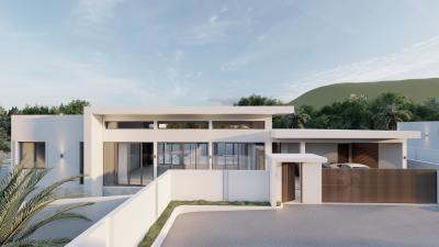 Modern single story residential house with flat roof design