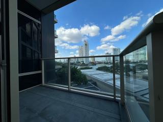 Spacious balcony with cityscape view