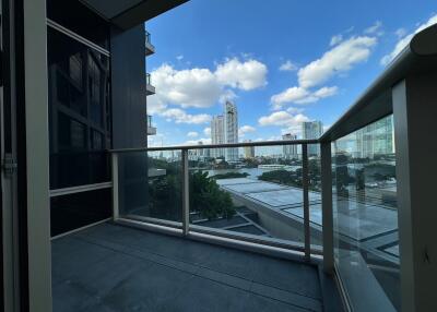 Spacious balcony with cityscape view