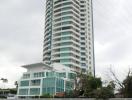 Modern high-rise residential building from a waterfront perspective