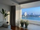 Bright and spacious living room with a view of the city skyline