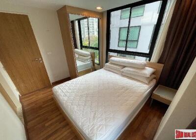 Zenith Place Sukhumvit 42 - Modern Condo with Bright Living Space, 1 Bedroom, and Prime Ekamai Location