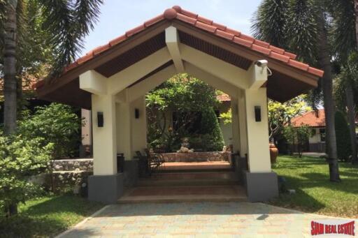 A private compound with a pool villa, a second house and more in Nakhon Pathom.