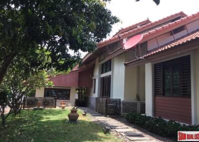 A private compound with a pool villa, a second house and more in Nakhon Pathom.