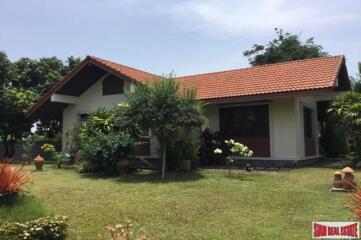 A private compound with a pool villa, a second house and more in Nakhon Pathom.