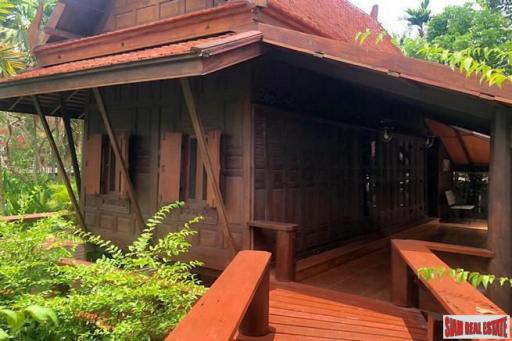 Traditional Thai Style House with Six Bedrooms and Wrap Around Terrace for Sale in Laksi