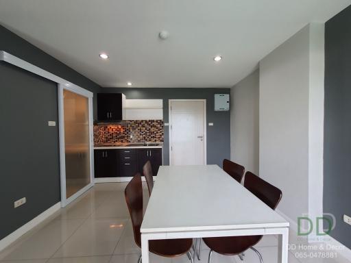 Modern kitchen with dining area in a contemporary apartment