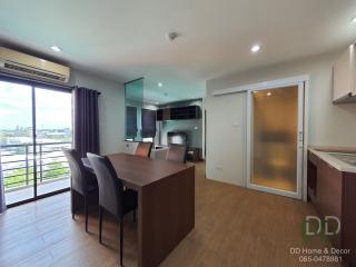 Spacious living room with dining area and open kitchen