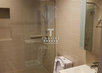 Modern bathroom with shower enclosure and toilet