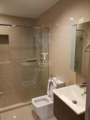 Modern bathroom with shower enclosure and toilet