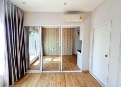 Bright and airy bedroom with balcony access