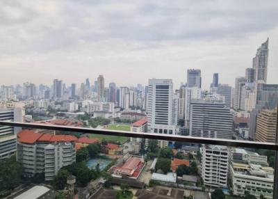 Panoramic cityscape view from a high-rise apartment