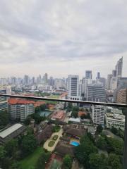 Panoramic cityscape view from a high-rise apartment