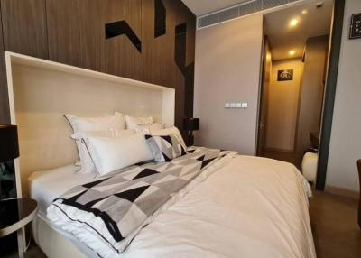 Modern bedroom with king-size bed and stylish decor