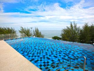 Outdoor swimming pool with ocean view