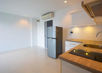 Modern kitchen with stainless steel appliances and ample countertop space