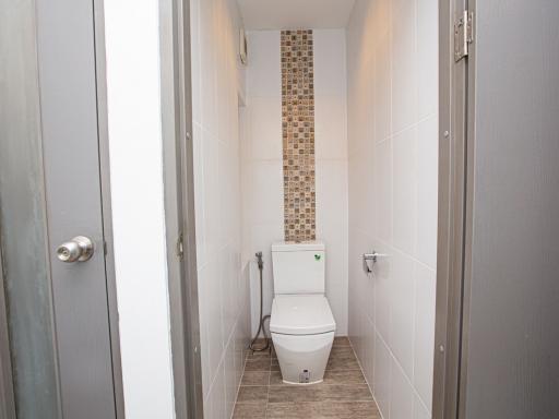 Modern bathroom with tiled flooring