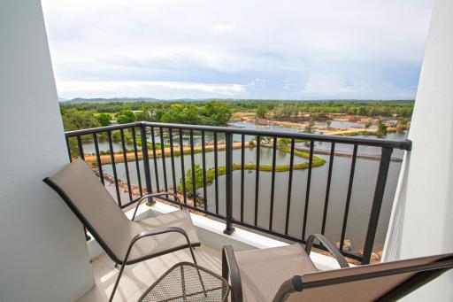 Spacious balcony with scenic view and seating arrangement