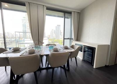 Modern dining room with natural light and city view