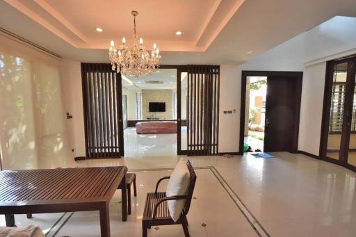 Elegant living room with chandelier and open floor plan
