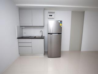 Modern kitchen with stainless steel appliances