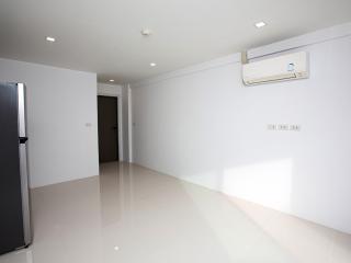 Spacious empty interior of a modern building with glossy floor