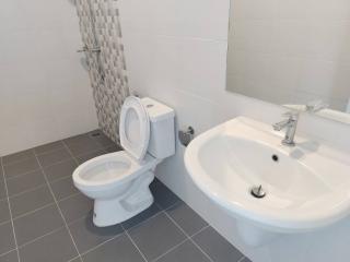 Modern bathroom with toilet and basin