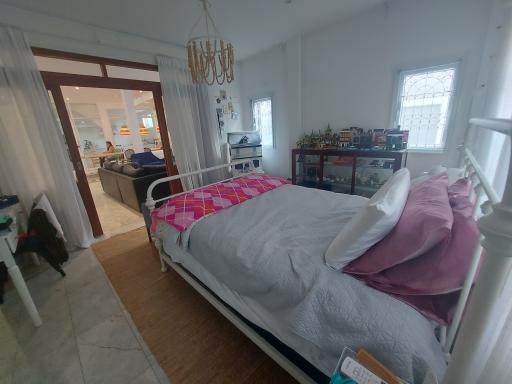 Spacious bedroom with connected living area