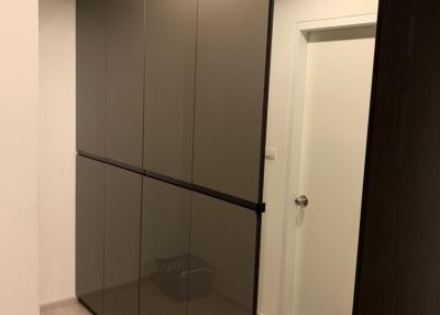 Modern bedroom with a large mirrored wardrobe
