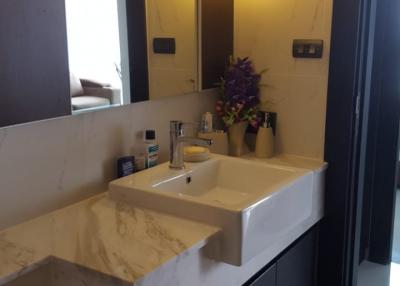 Modern bathroom with marble sink and sleek design