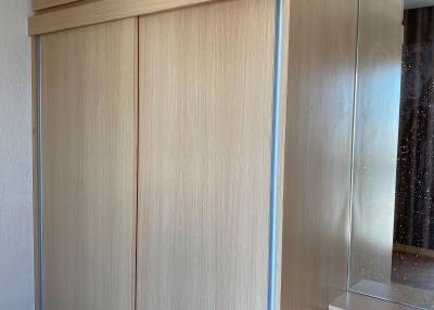 Spacious bedroom wardrobe with mirrored section