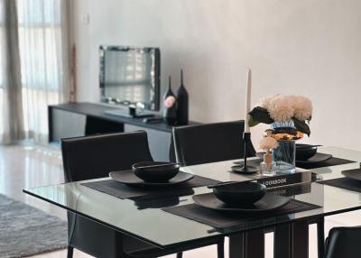 Modern dining area with table set for four