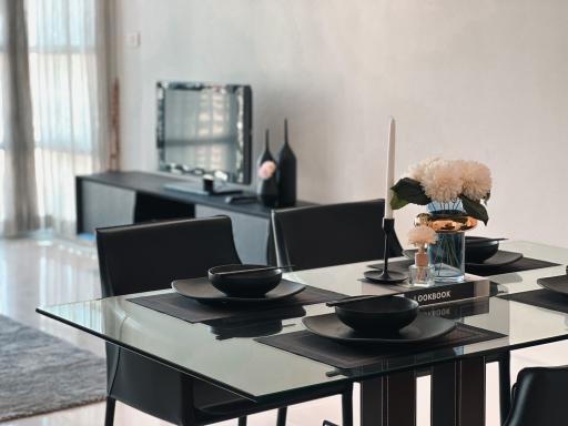 Modern dining area with table set for four