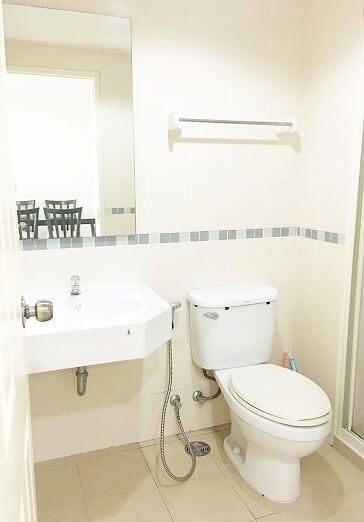 Clean white bathroom with modern amenities