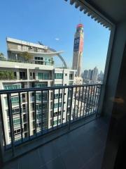 City view from a high-rise apartment balcony