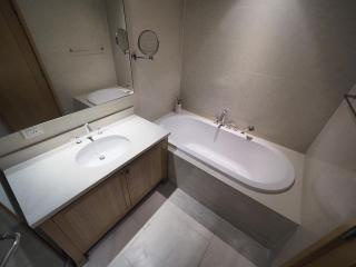 Modern bathroom with sink and bathtub