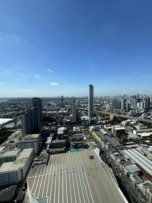 Sweeping cityscape from a high-rise building showcasing the urban skyline