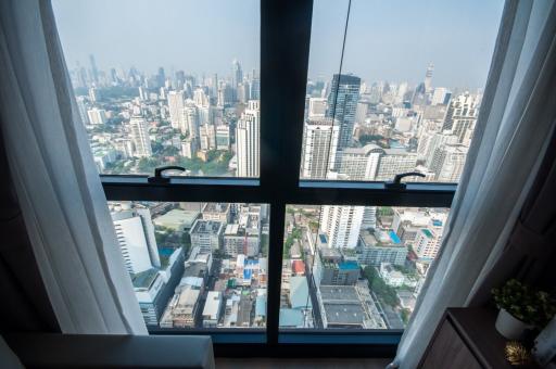 High-rise apartment view overlooking the city through large windows