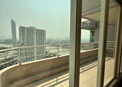 Spacious balcony with city view and ample sunlight