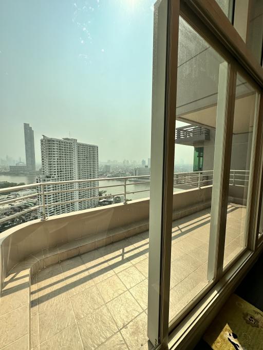 Spacious balcony with city view and ample sunlight