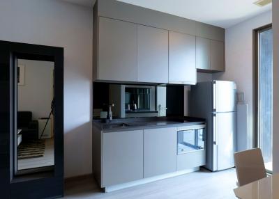 Modern kitchen with sleek cabinetry and stainless steel appliances