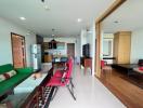 Spacious open-plan living area with kitchen, dining, and lounge zones