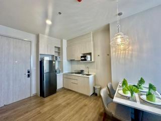 Modern kitchen with dining area in a new apartment