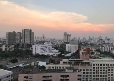 Panoramic view of city skyline at dusk from high-rise building
