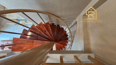 Modern spiral staircase in a home interior