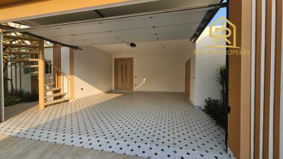 Modern home garage with tiled flooring and large space