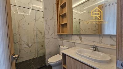 Modern bathroom with marble tiles and elegant fixtures