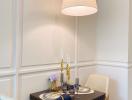 Elegant dining area with modern lighting and stylish dinner table setup